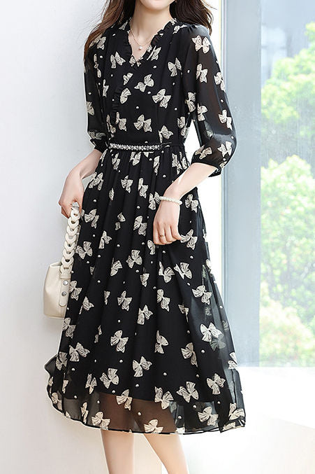 Early autumn trendy bow-printed dress