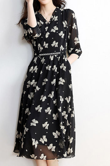 Early autumn trendy bow-printed dress